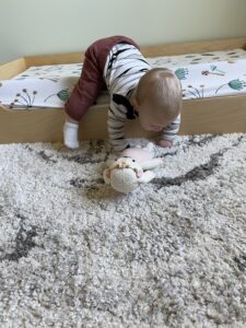 Baby crawling out of bed